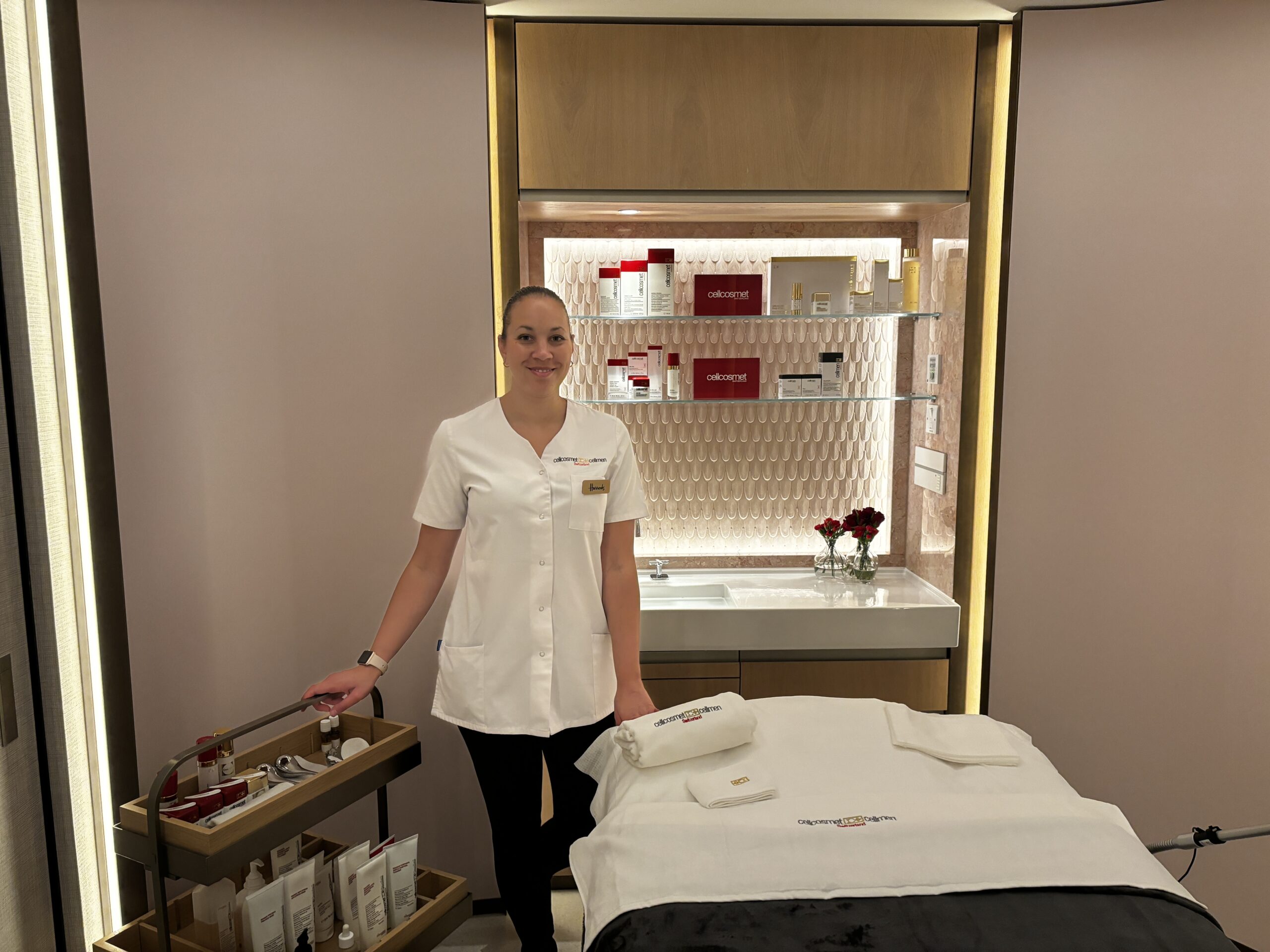 Facialist waiting to deliver a facial in a beauty room