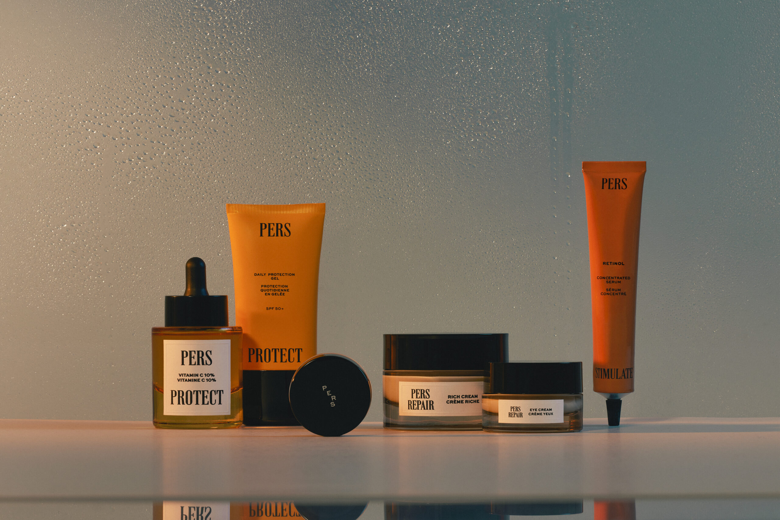 Range of PERS products with a sunset background